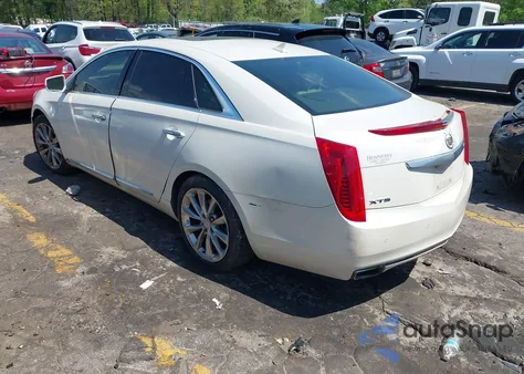 2014 Cadillac Xts Luxury from USA, damaged, VIN 2G61M5S32E9310910